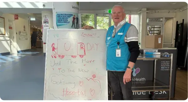 Man next to a whiteboard with '0 days to move' message.