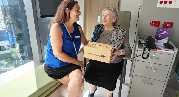 Nurse Unit Manager Karen Garratt with patient