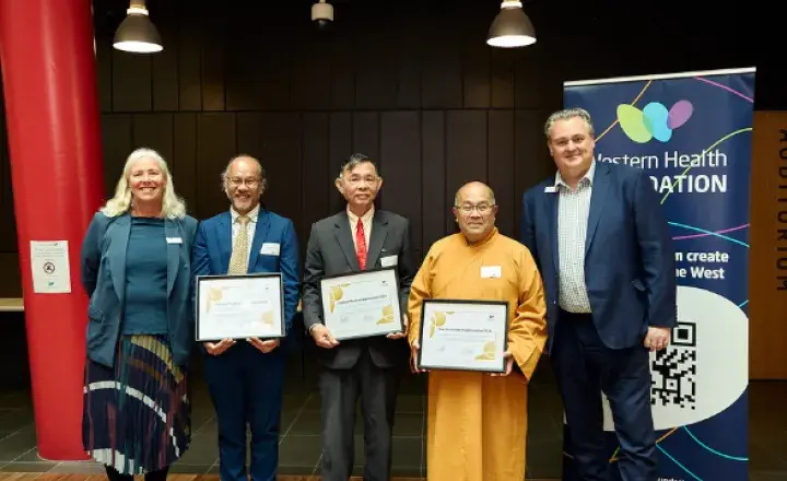 Members of the Vietnamese community with CEO Russell Harrison