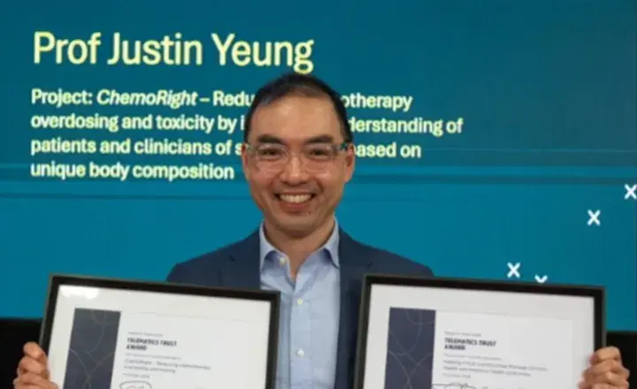 Justin Yeung with awards