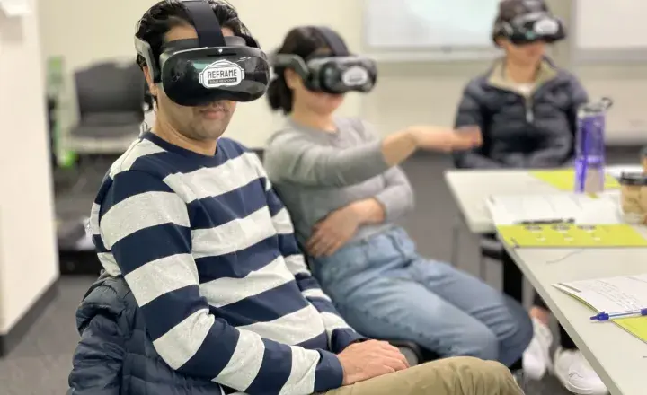 People wearing Virtual Reality headsets in OVA training