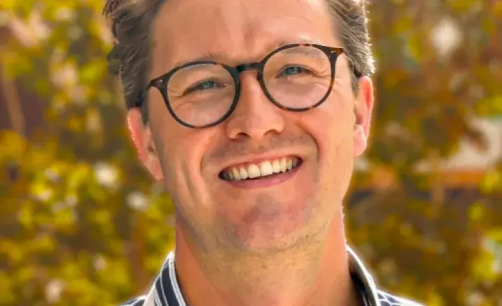 Dr Michael Ashby smiling at camera
