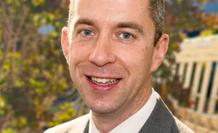 Dr Duncan Carradice smiling at camera